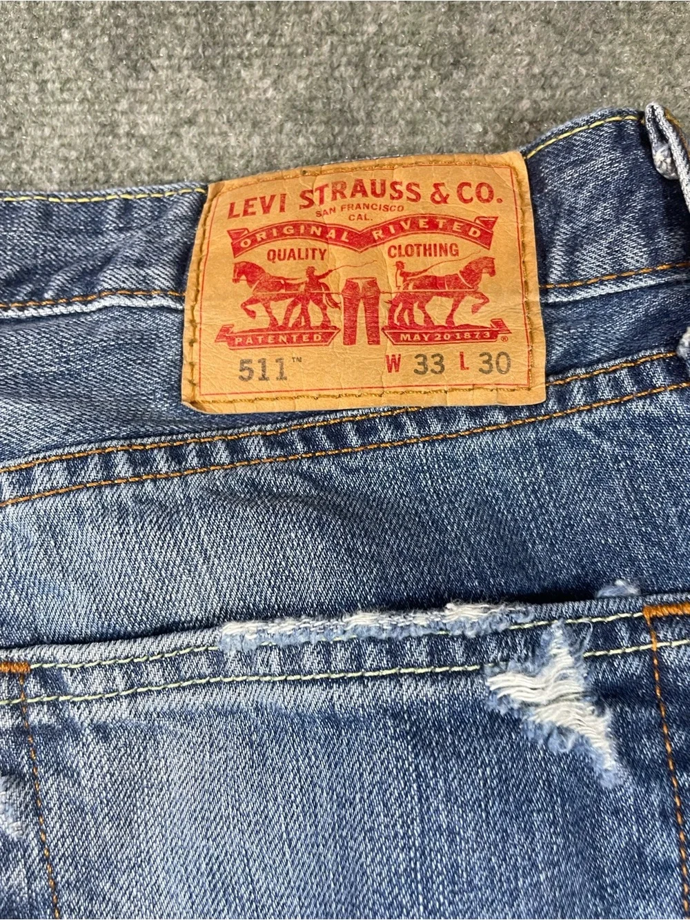 Levi's 511 Medium Blue Distressed Straight Jeans